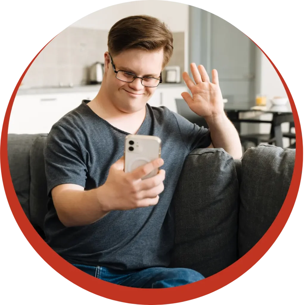 Disabled man with down syndrome on video call